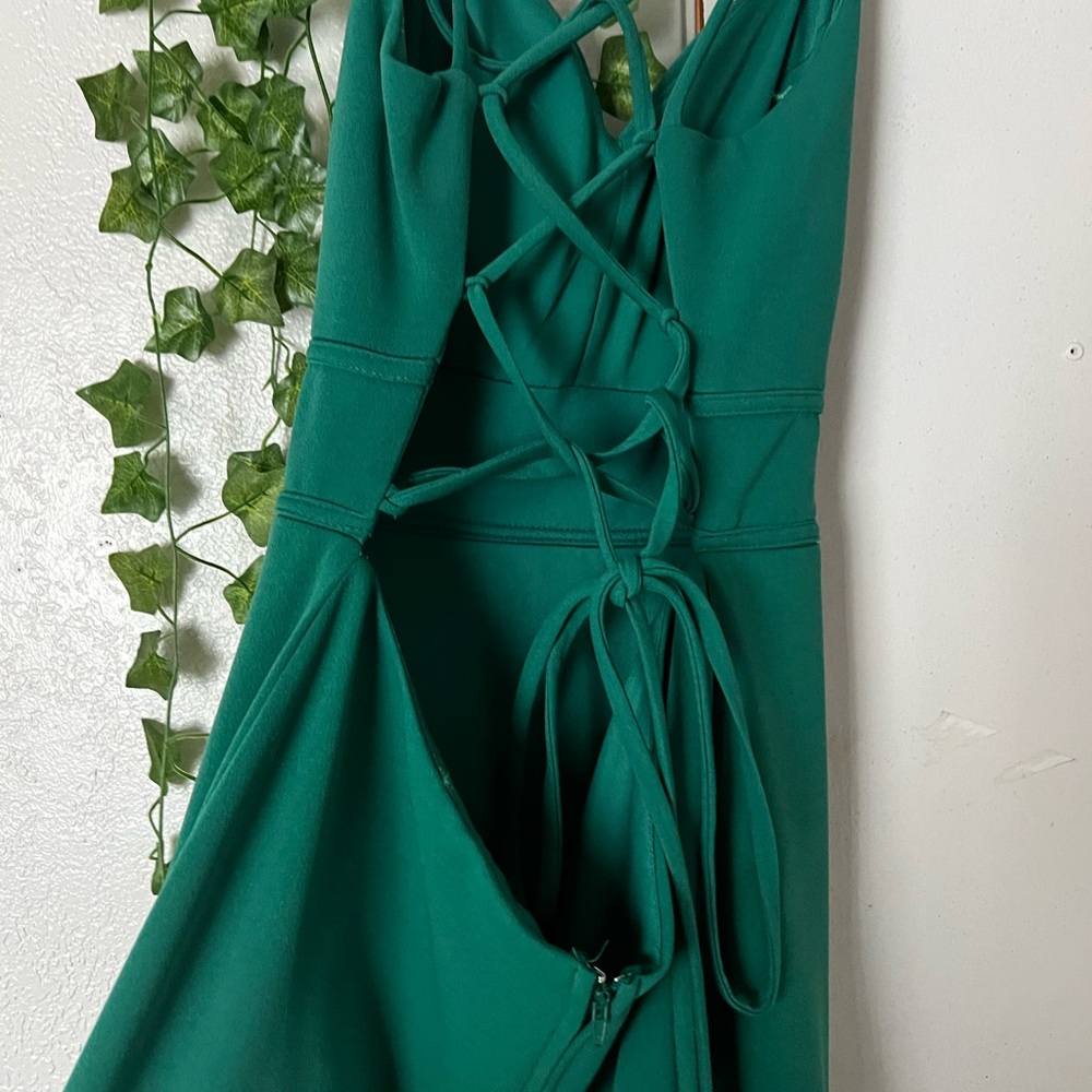 Im selling a green long dress that I wore one time for a wedding